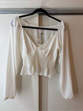 Women's White Smocked Peplum Long-Sleeve Top
